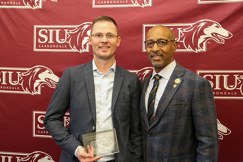 Jeff Schirmer poses with SIU Dean Marc Morris